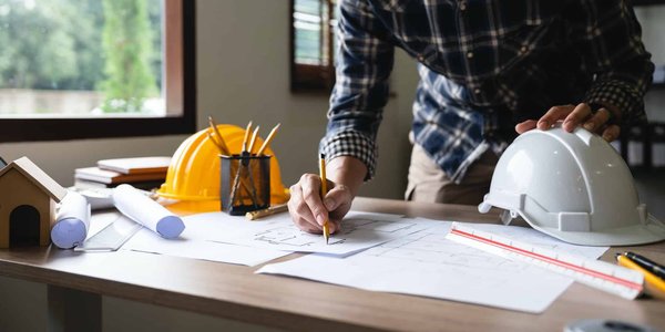 Quel rôle joue un économiste de la construction dans la réalisation d'un projet immobilier ?